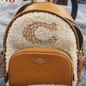 Coach court backpack with Coach motif